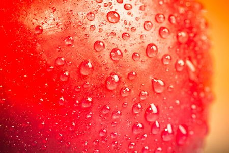 Apple drops on a wet surface. Shallow depth of fieldの写真素材