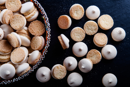 Many cookies in turkish dish on a black table.の写真素材