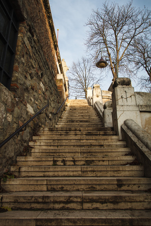 Stone staircase of an old building. View from the bottom up.