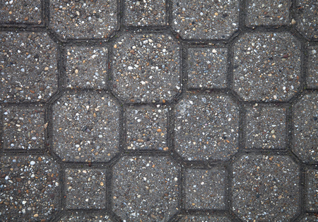 Sidewalk tile made of natural stones. Background.の写真素材