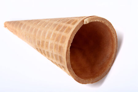 Empty sugar waffle cones on white background.の写真素材