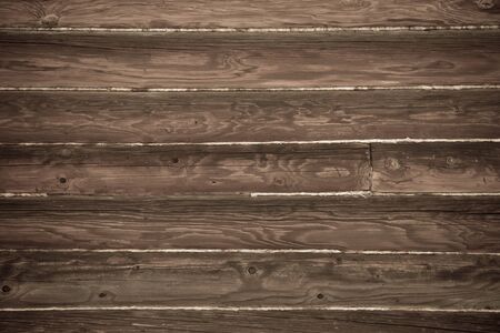 Old brown wooden wall. Background. Toned.の写真素材