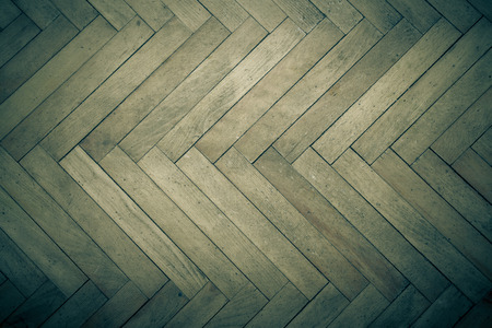 Old light wooden parquet. Background. Toned.の写真素材