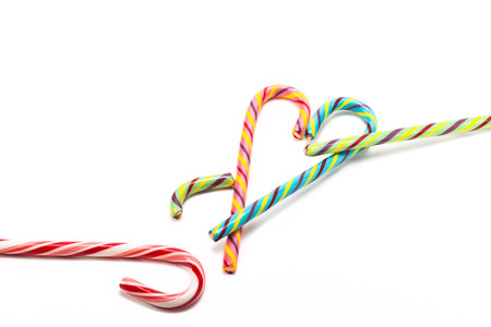Colored candy sticks on a light background.の写真素材