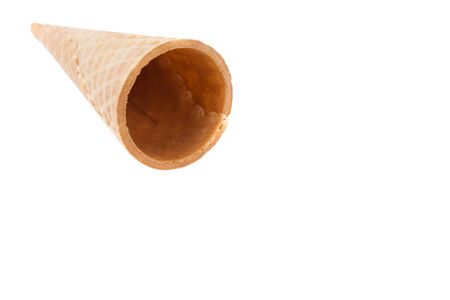 Empty sugar waffle cone ice cream isolated on white background.の写真素材