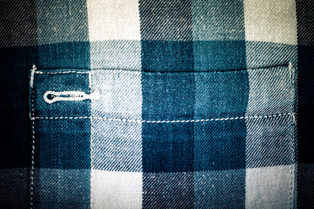 Flannel checkered background. Toned.