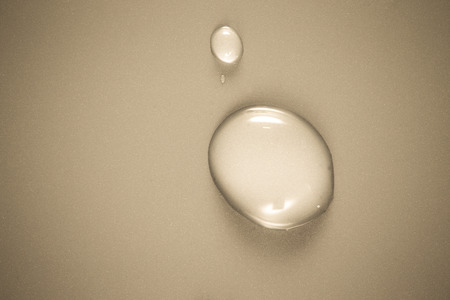Drops of water on a color background. Shallow depth of field. Selective focus. Toned.の写真素材