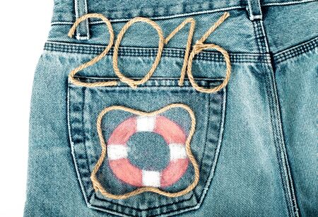 Lifebuoy and rope number 2016 on jeans pocket background.