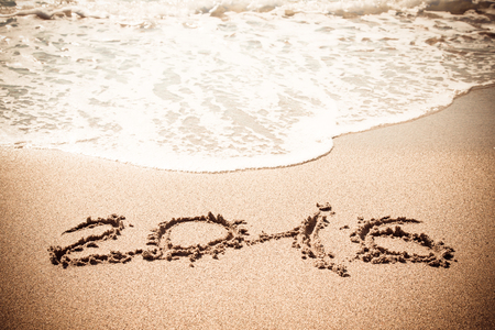 Figures 2016 sea wave with foam washes sand on the beach in Alanya Turkey. Toned.の写真素材