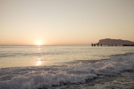 Beautiful sunset over Mediterranean sea. Turkey in autumn. Alanya. Natural background. Toned.の写真素材
