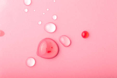 Colored drops a light background. Toned.の写真素材