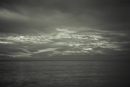 Sea view on the background of beautiful sunset. Toned.の写真素材