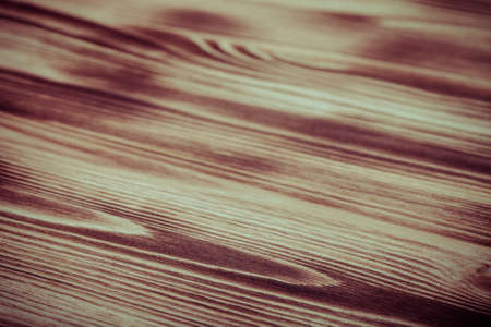 New light wooden burned background. Selective focus. Toned.の写真素材