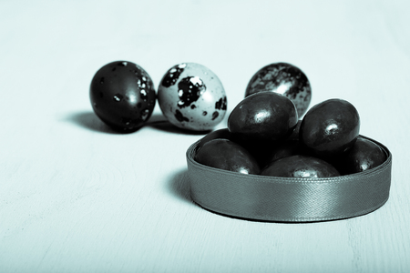 Easter symbols on wooden background. Selective focus. Toned.の写真素材
