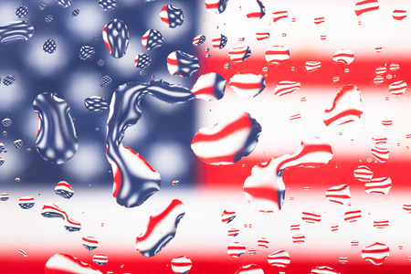 Drops of water on a defocused color background. Shallow depth of field. Selective focus.の写真素材