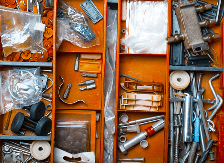 The contents of the old toolbox. Top view. Toned.