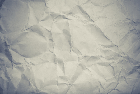 The texture of crumpled paper for background. Toned.の写真素材