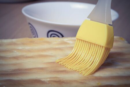 The process of making homemade cake. Shallow depth of field. Selective focus. Toned.の写真素材
