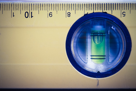 Old instrument "level" close up. Top view. Toned.の写真素材