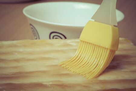The process of making homemade cake. Shallow depth of field. Selective focus. Toned.の写真素材