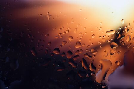 Drops of water on a color background. Shallow depth of field. Selective focus.の写真素材