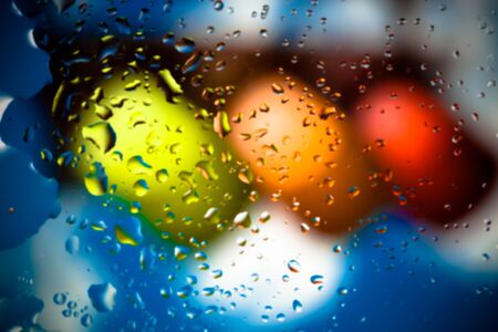 Drops of water on a color background. Shallow depth of field. Selective focus. Toned.の写真素材