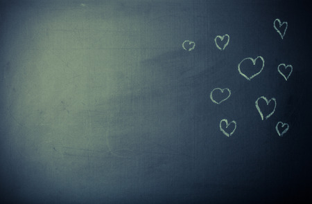 Romantic theme on a chalkboard. Toned.の写真素材