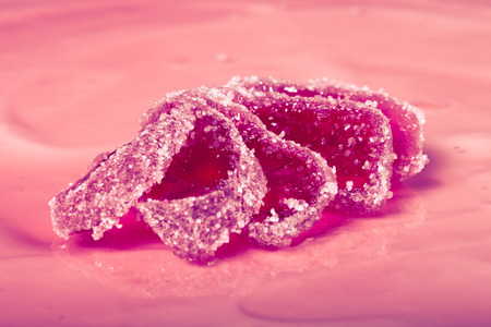 Fresh homemade cheesecake with pink jelly. Shallow depth of field. Toned.