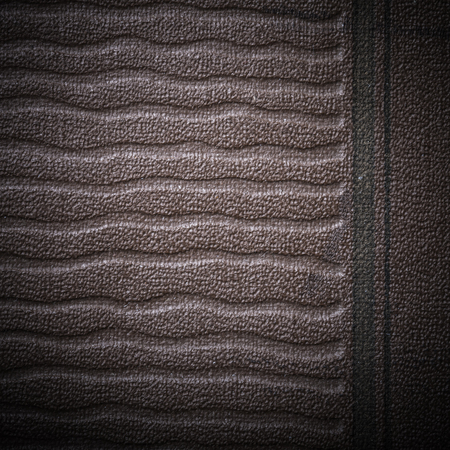 Old surface of leatherette for textured background. Toned.