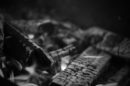 Hot coals of a bonfire. Defocused. Toned.の写真素材