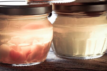 Bright yellow jam - dandelion flower honey. Selective focus. Shallow depth of field. Toned.の写真素材