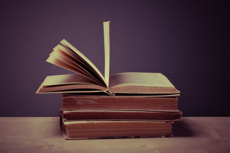 Old books. Selective focus. Shallow depth of field. Toned.の写真素材