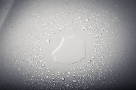 Drops of water on a color background. Gray. Selective focus. Toned.の写真素材