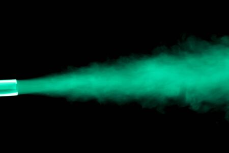 Cloud of smoke on black background. Selective focus. Toned.の写真素材