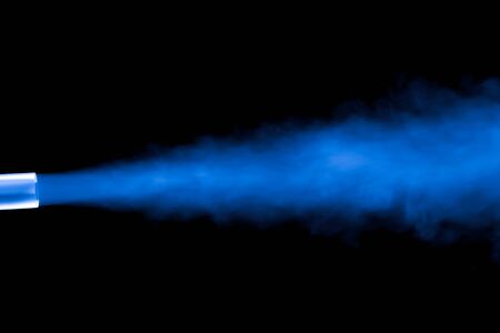 Cloud of smoke on black background. Selective focus. Toned.の写真素材