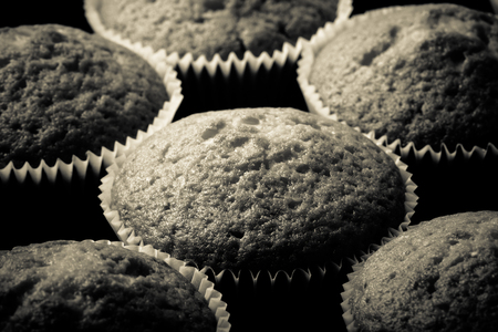 Fresh cupcake desert before decoration. Selective focus. Shallow depth of field. Toned.の写真素材