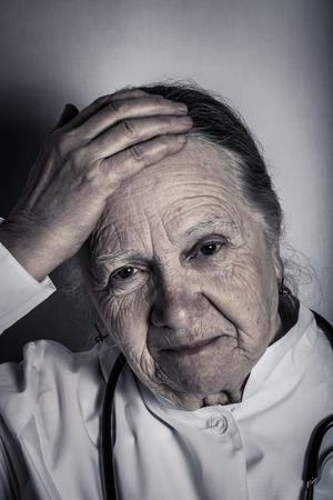 Portrait of senior female doctor. Toned.の写真素材