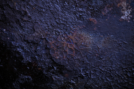 The bottom of the old cast-iron frying pan. Toned.の写真素材