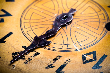 Clock face of the old clock. Selective focus. Shallow depth of field. Toned.の写真素材
