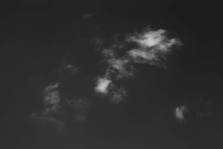 White clouds on a blue sky. Selective focus. Toned.の写真素材