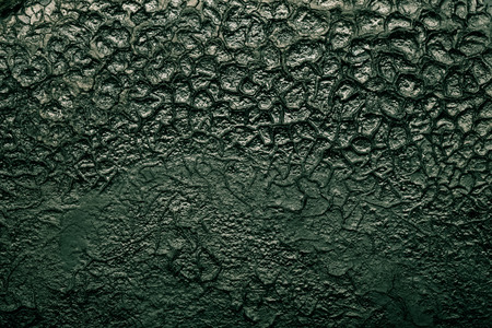 The bottom of the old cast-iron frying pan. Toned.の写真素材