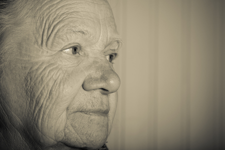 Portrait of an elderly woman. Closeup view. Toned.の写真素材