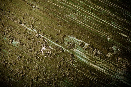 Painted wooden cutting board for background. Toned.の写真素材