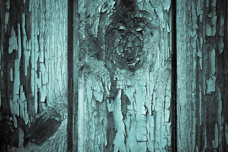 The old wooden houses painted wall. Closeup view. Selective focus. Toned.の写真素材