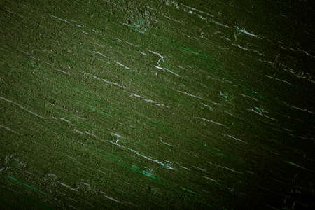 Painted wooden cutting board for background. Toned.の写真素材