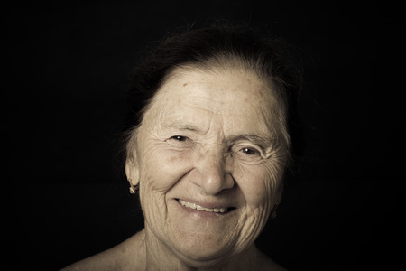Portrait of elderly woman Smile. Toned.