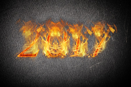 Happy new year 2017 - figures in flame.の写真素材