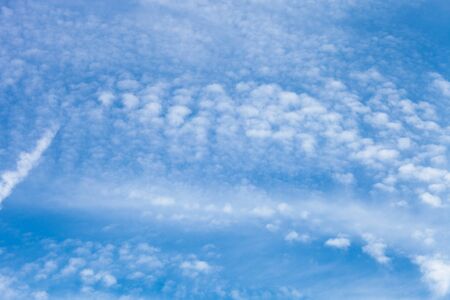 White clouds on a blue sky. Selective focus.