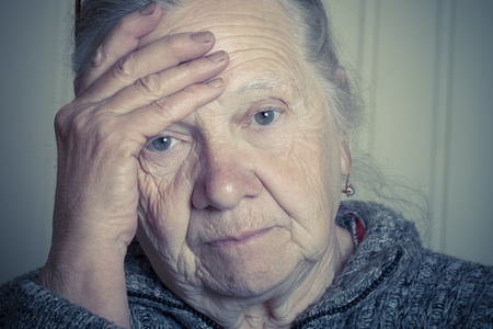 Portrait of elderly woman. Toned.の写真素材