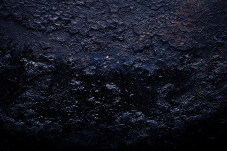 The bottom of the old cast-iron frying pan. Toned.